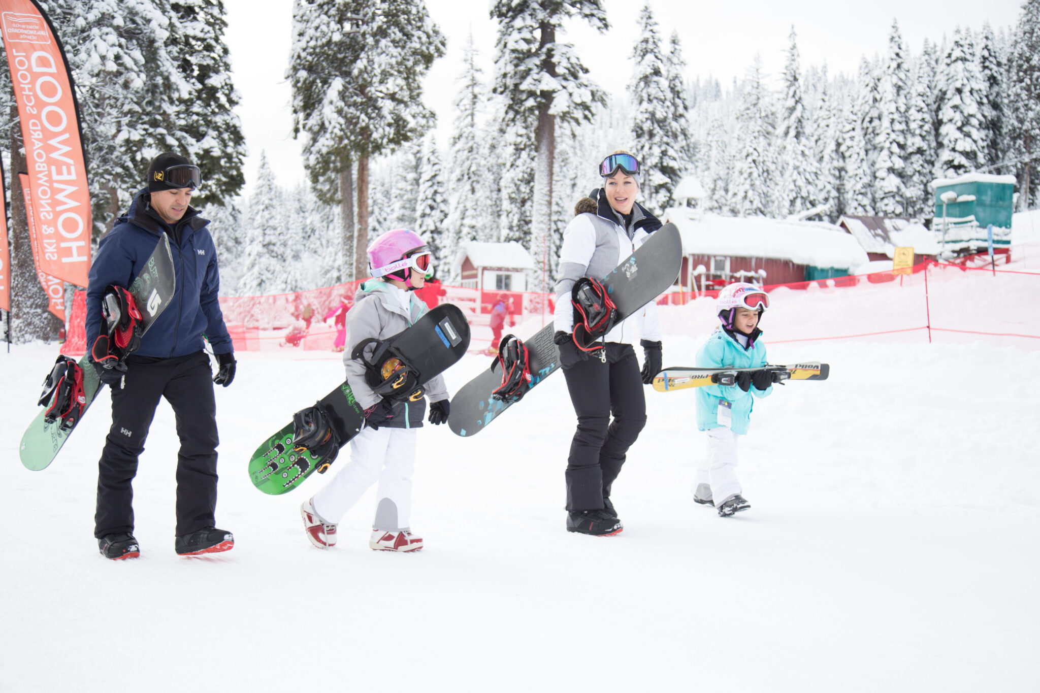 family arriving at ski resort