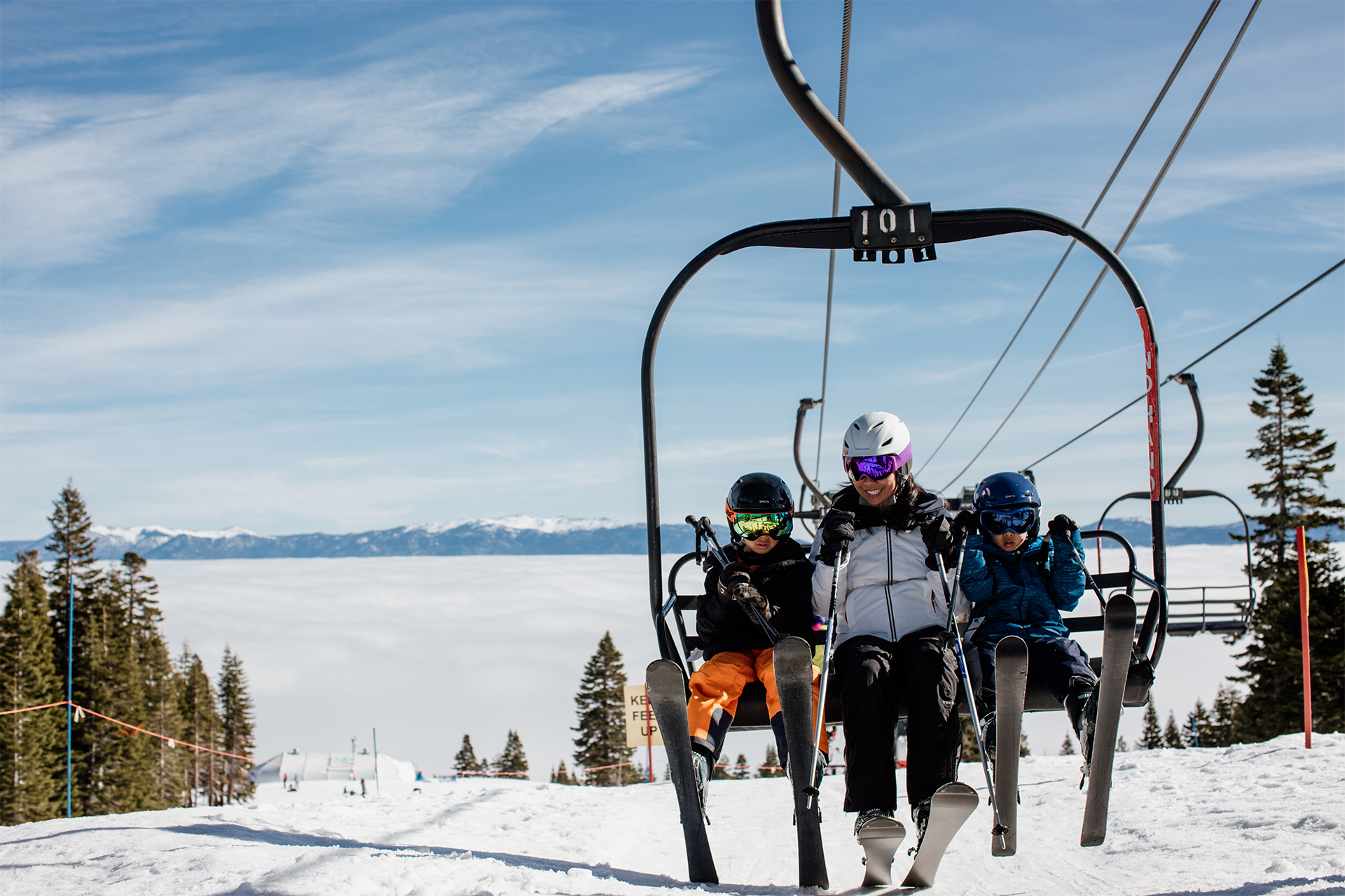 family getting off Madden ski lift